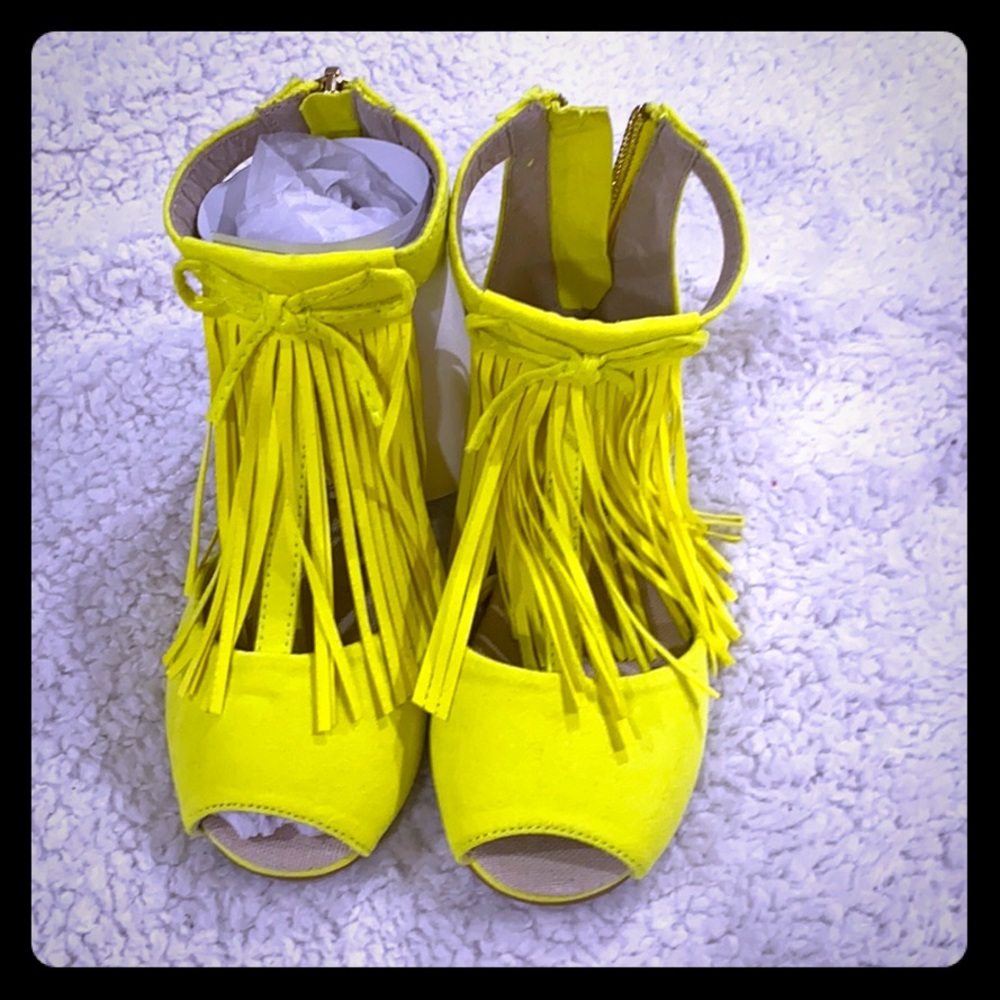 Yellow feet stick out sandals